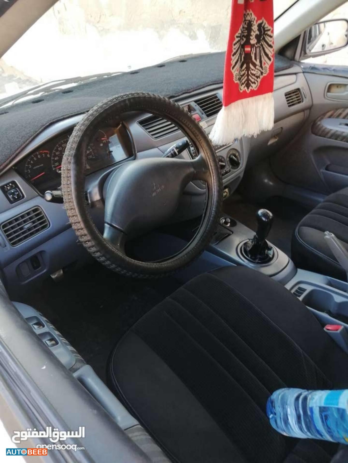 ميتسوبيشي لانسر 2003