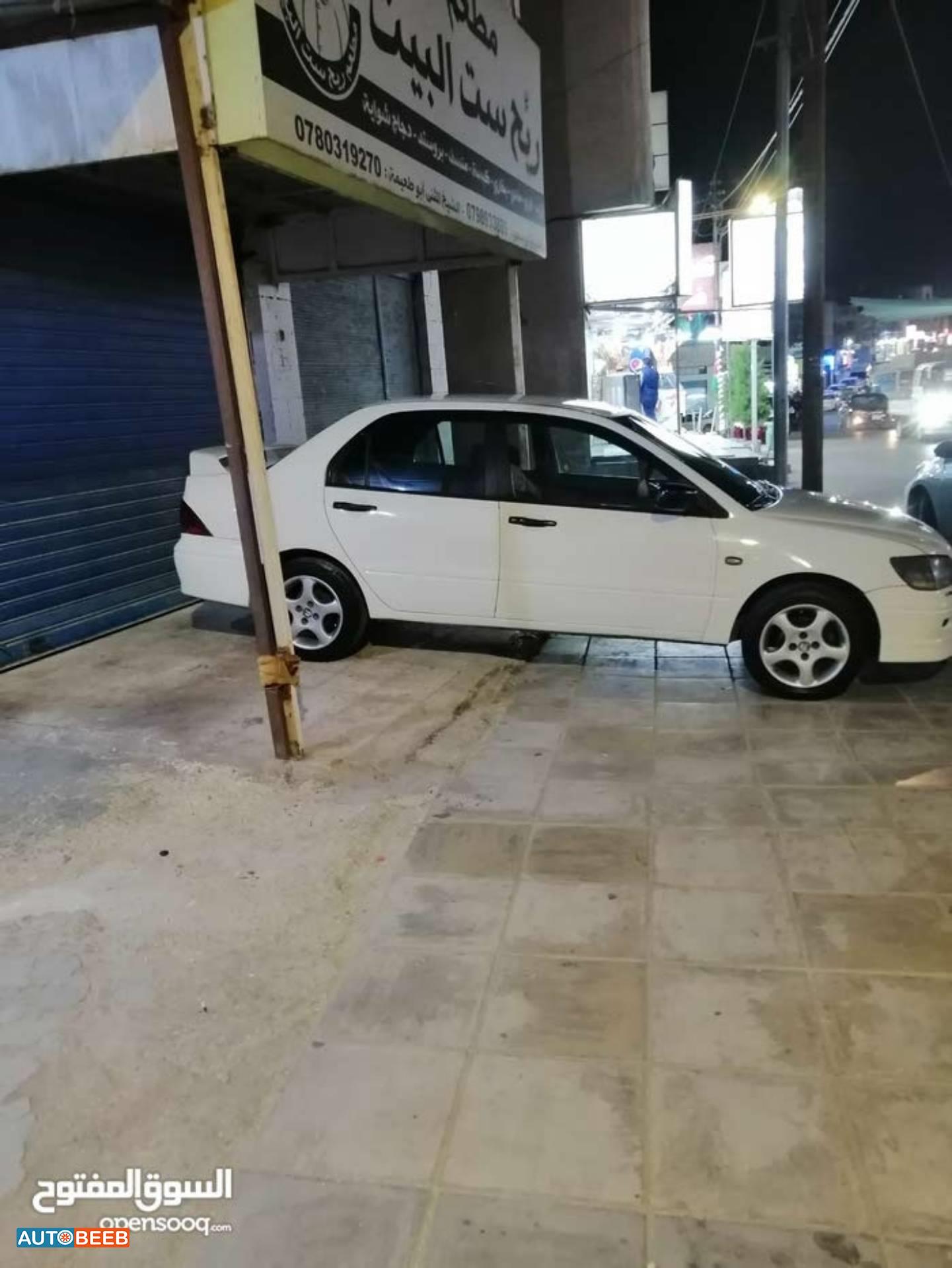 ميتسوبيشي لانسر 2003