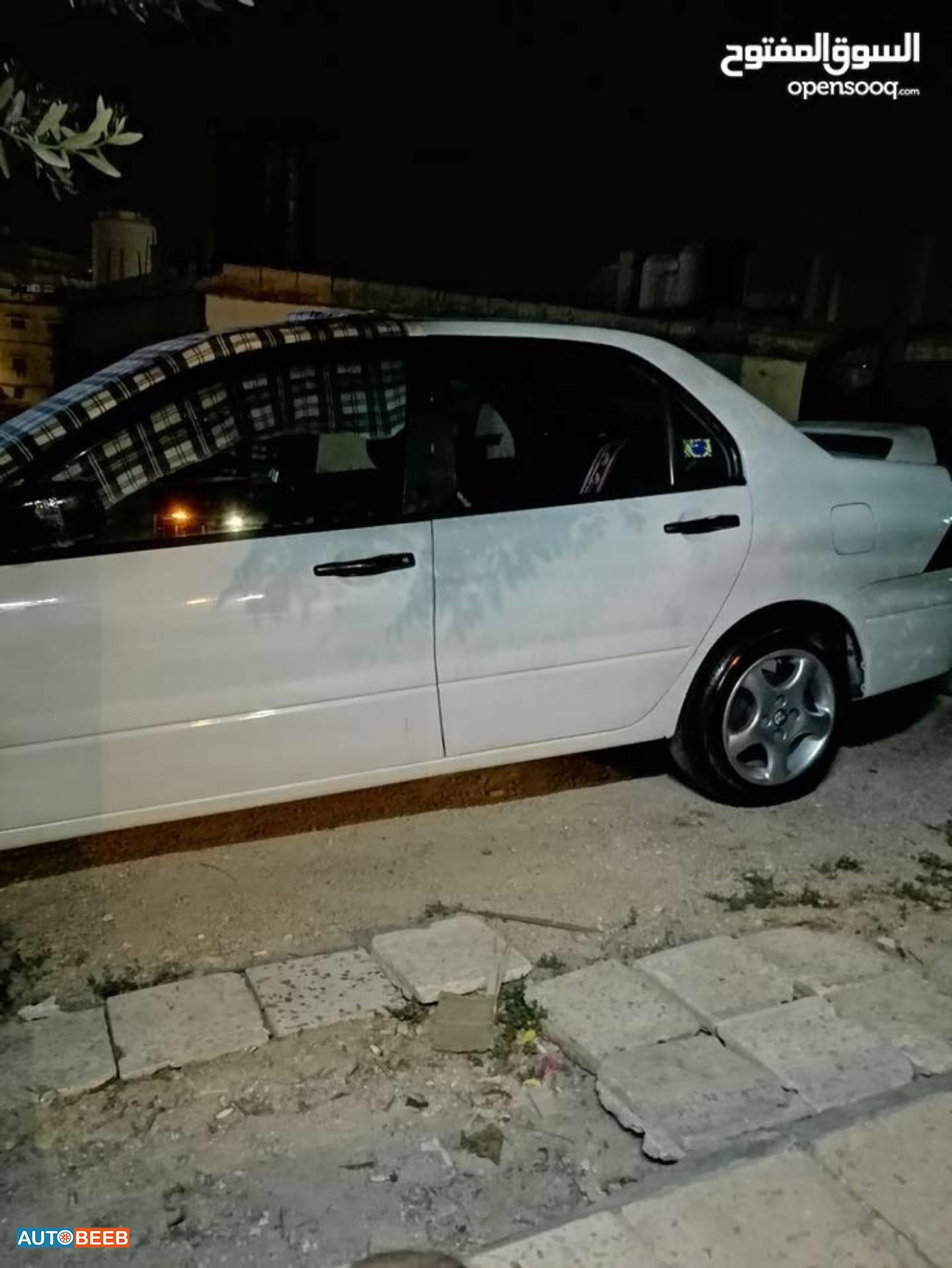 ميتسوبيشي لانسر 2003