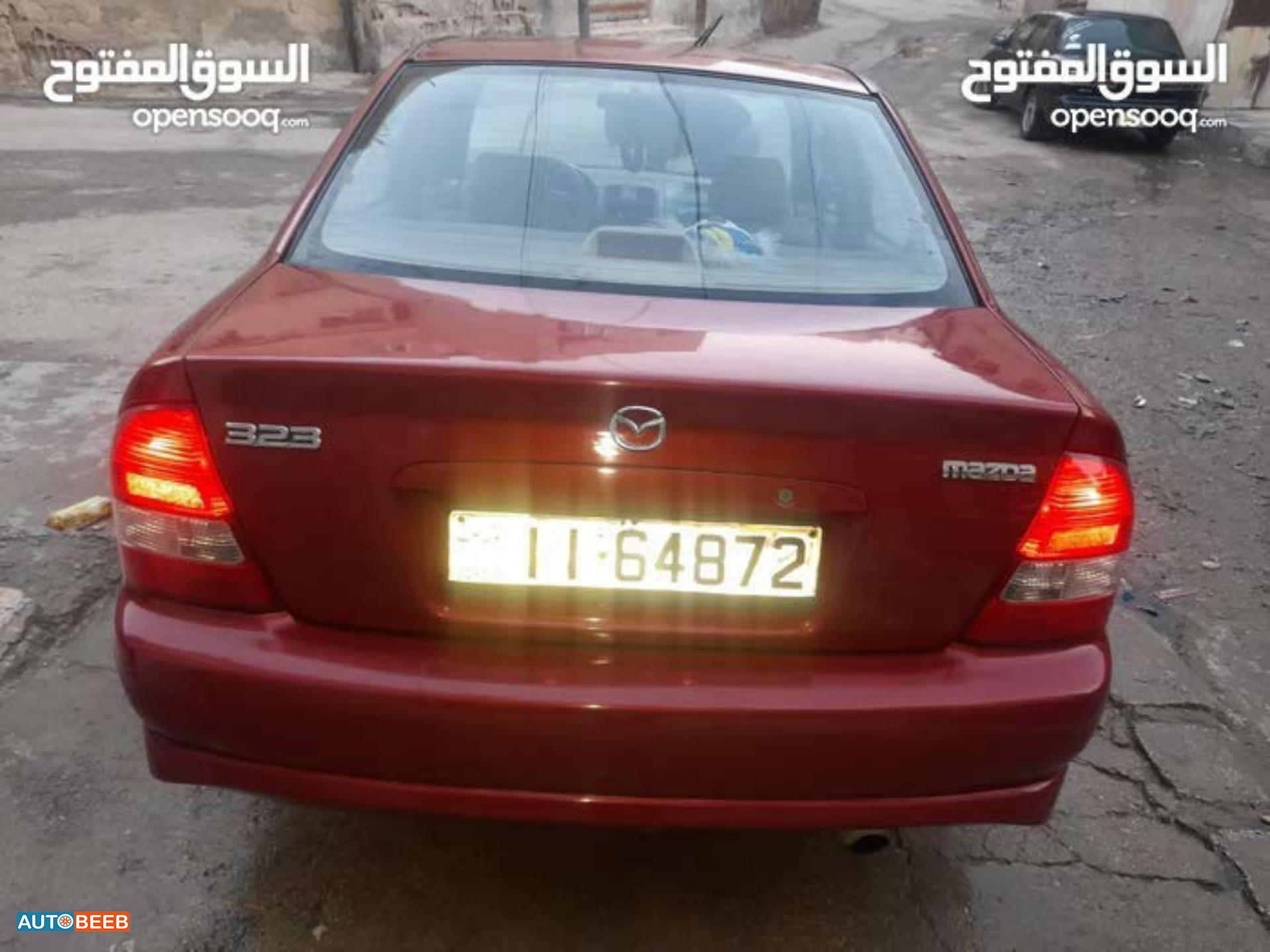 مازدا 323 2003