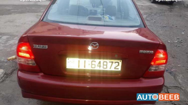 مازدا 323 2003