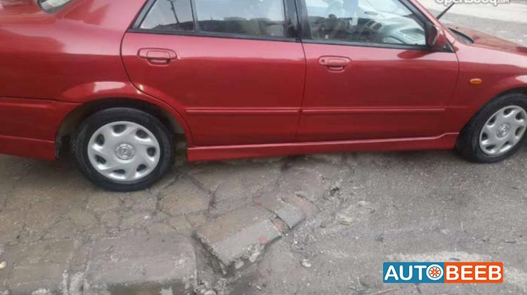مازدا 323 2003