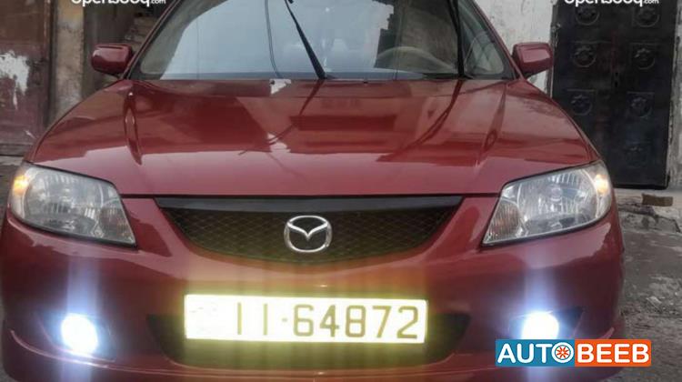 مازدا 323 2003