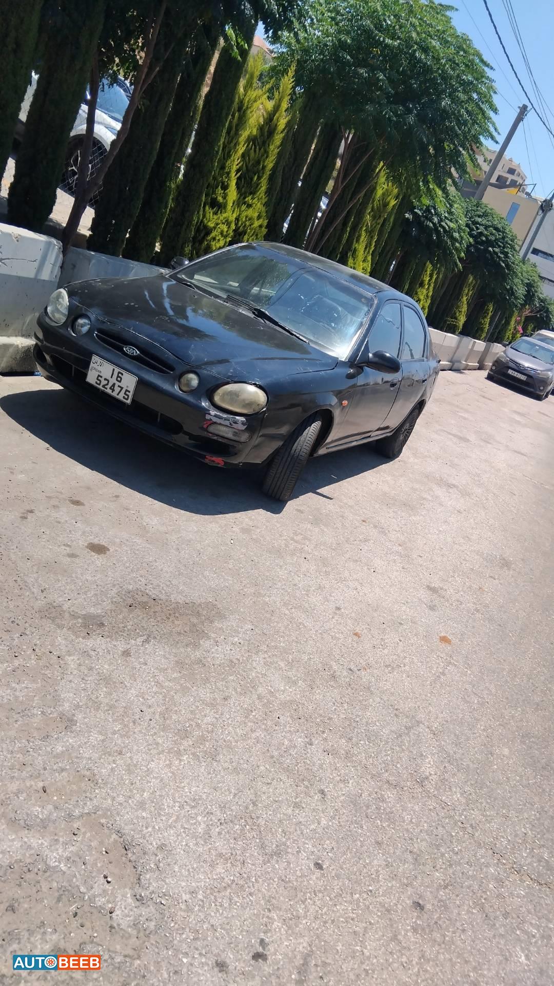 كيا شوما 1999