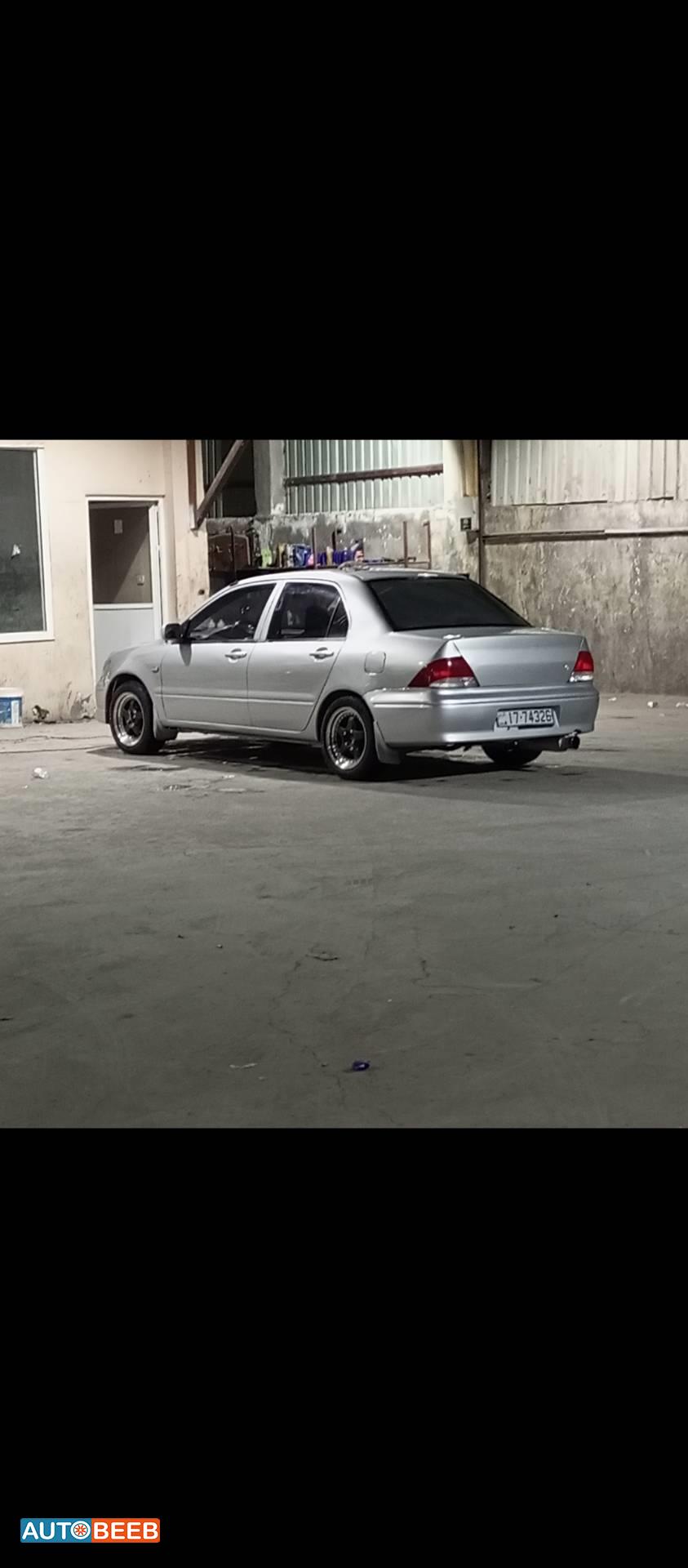 ميتسوبيشي لانسر 2002