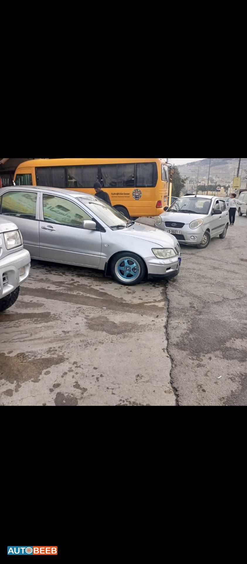 ميتسوبيشي لانسر 2002