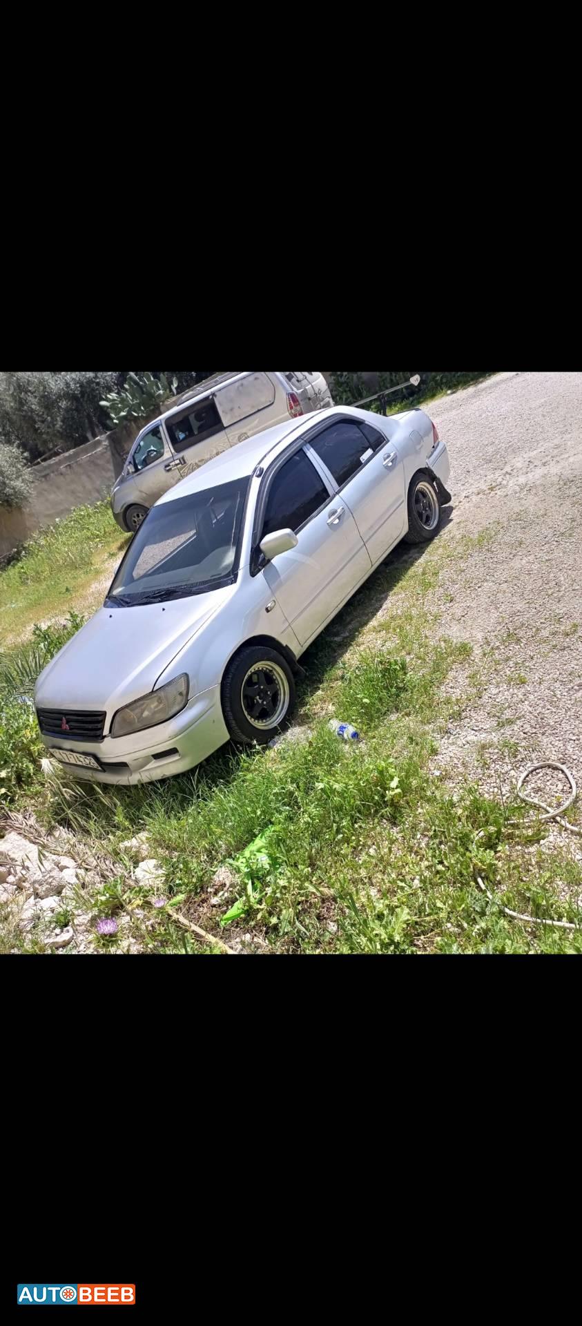 ميتسوبيشي لانسر 2002