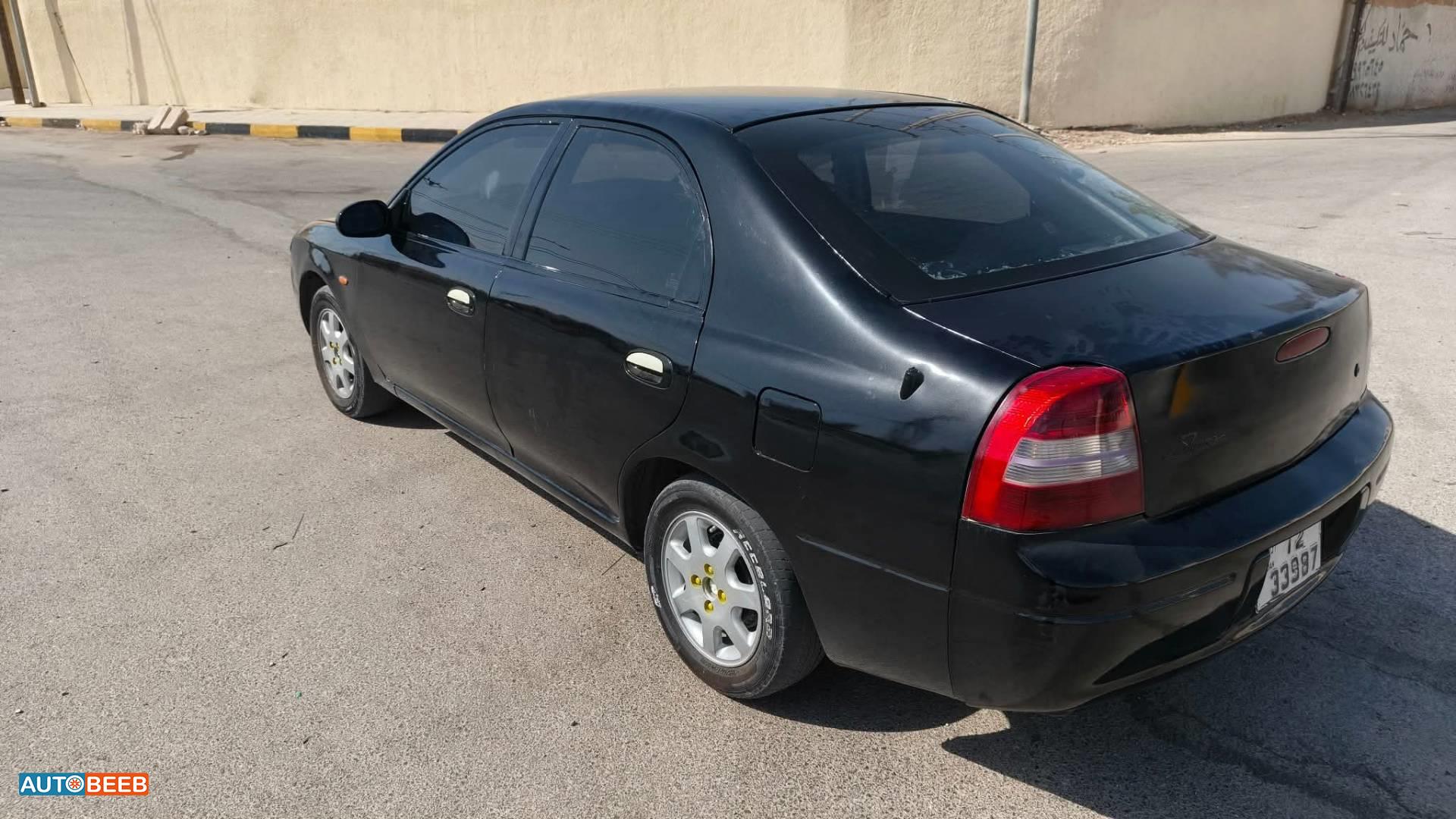 كيا شوما 1999