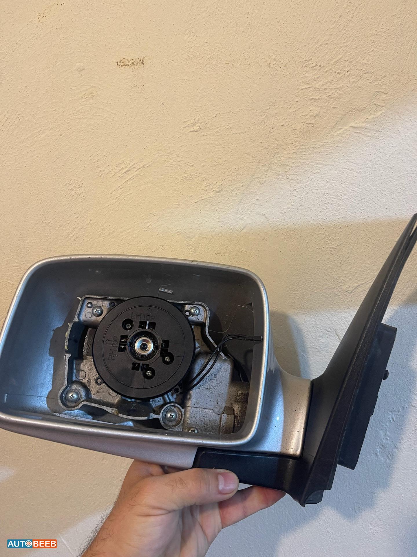 مراية  كيا سبورتيج بدون القزازة جهة السائق من سيارة موديل 2009