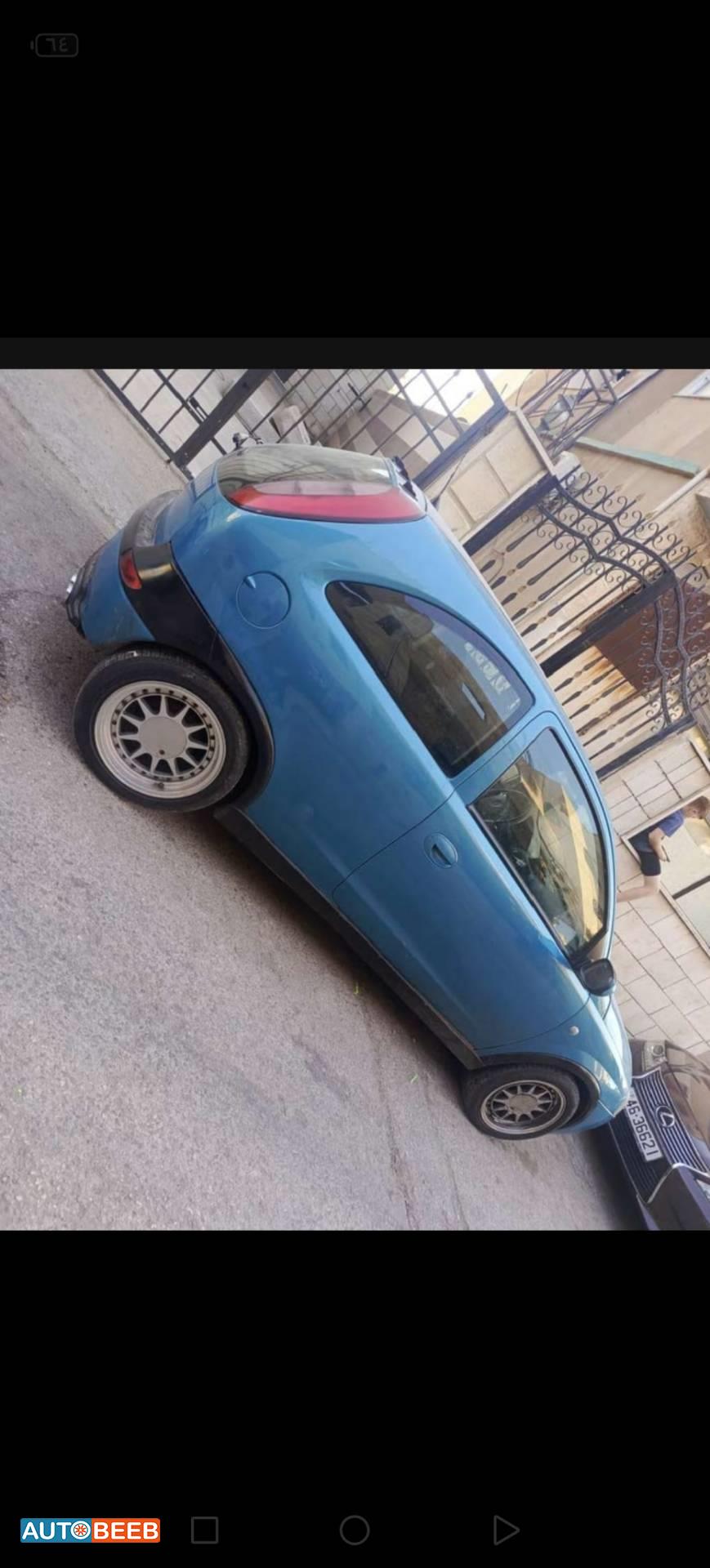 اوبل كورسا 2003