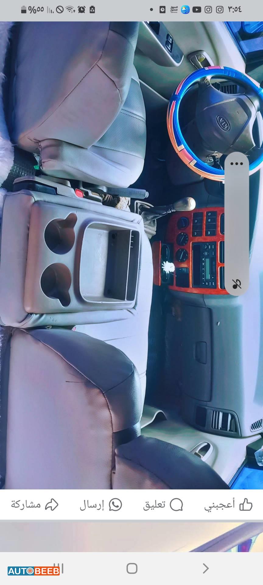 ميني باص كيا 2005