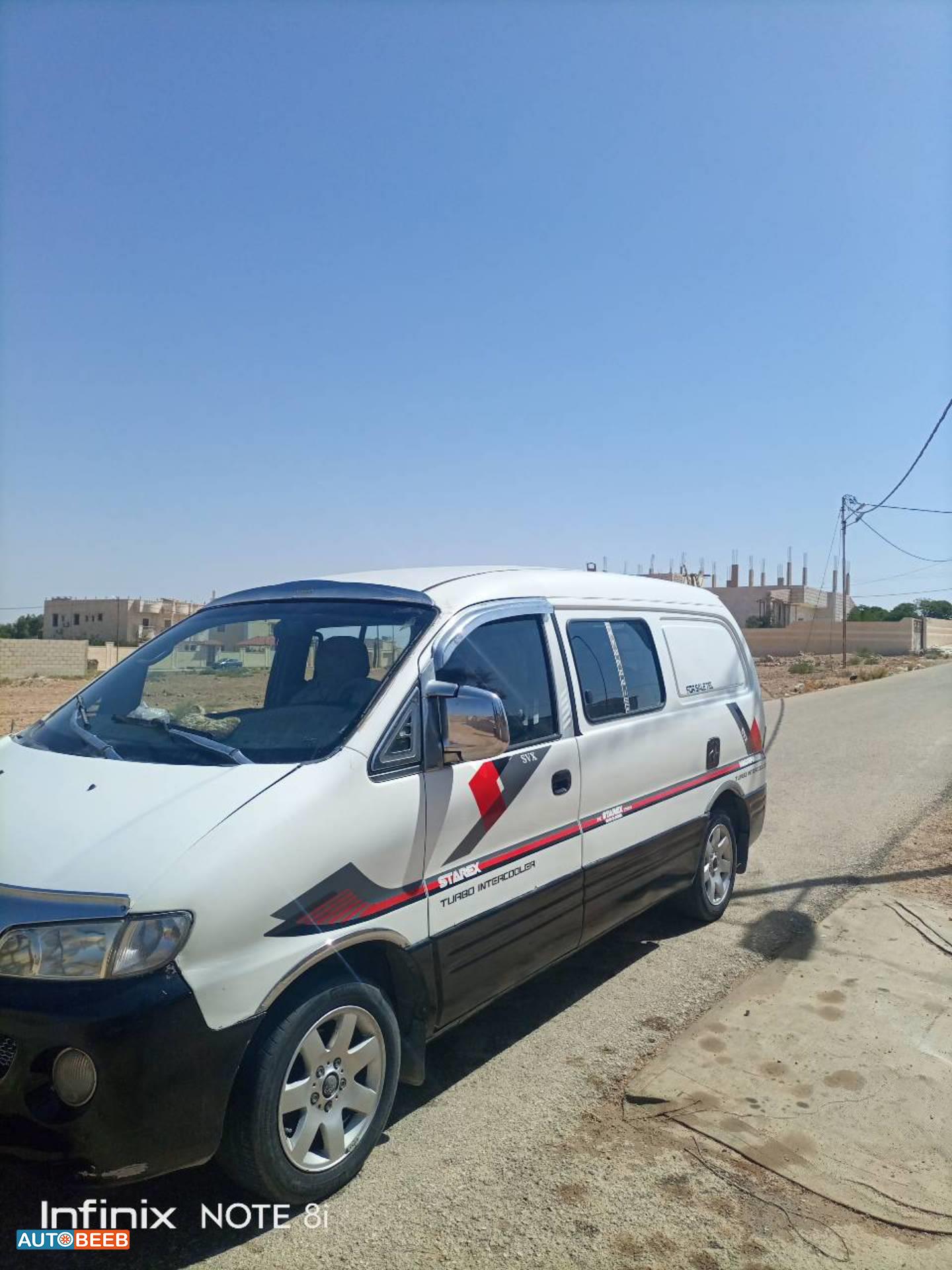 ميني باص هيونداي 2003