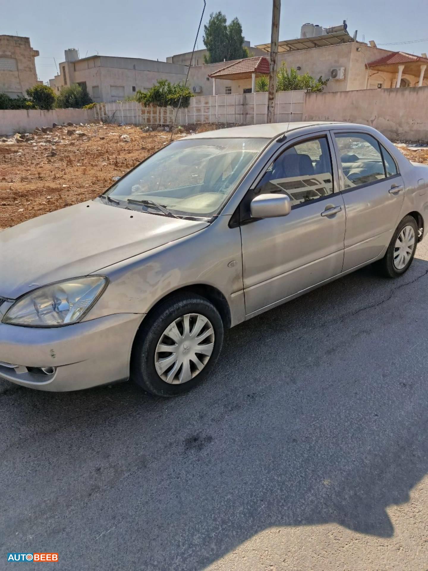 ميتسوبيشي لانسر 2004