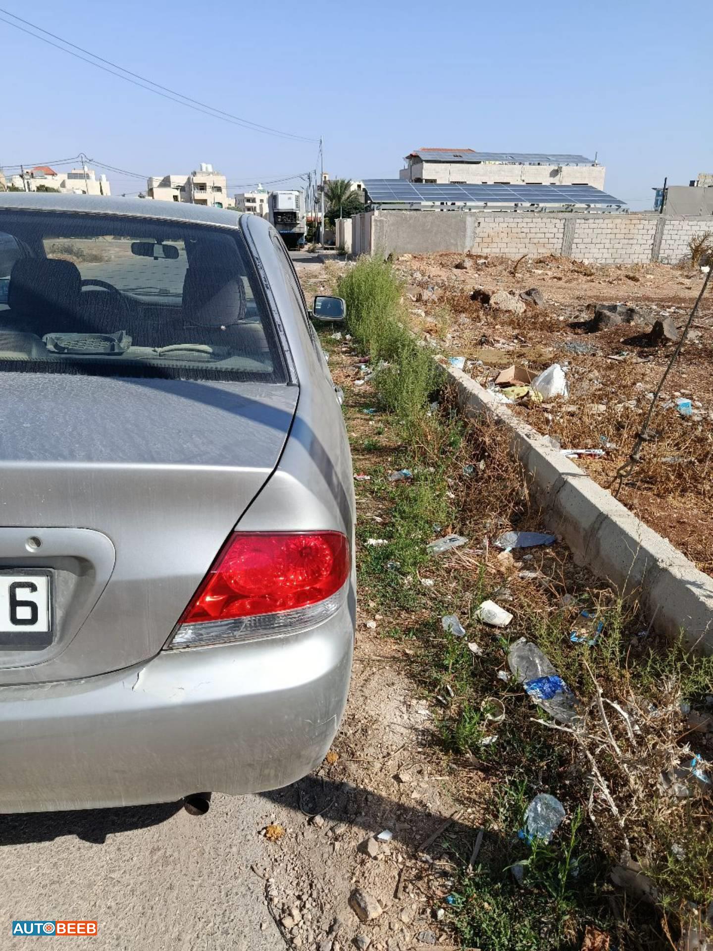 ميتسوبيشي لانسر 2004