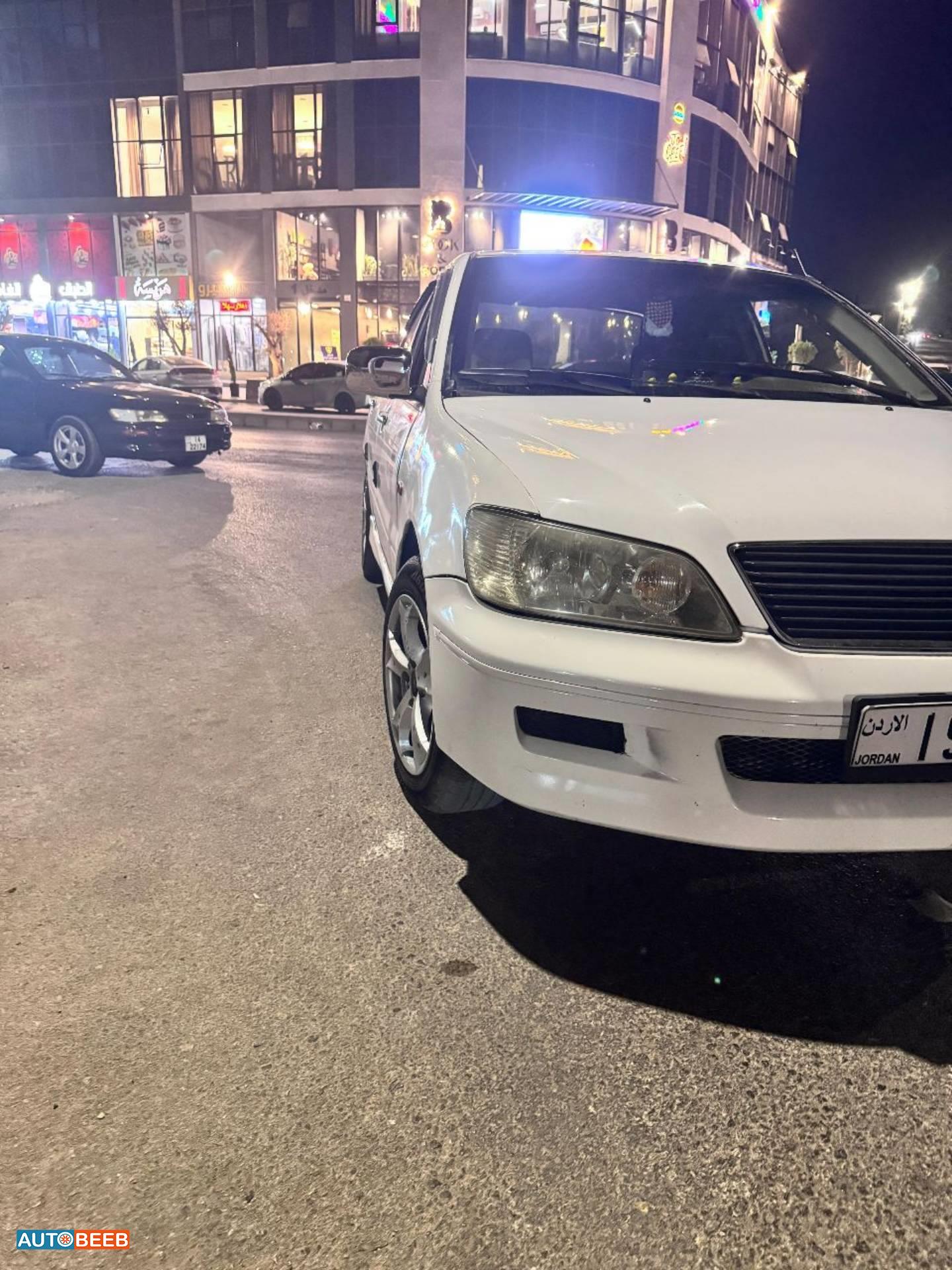 ميتسوبيشي لانسر 2003