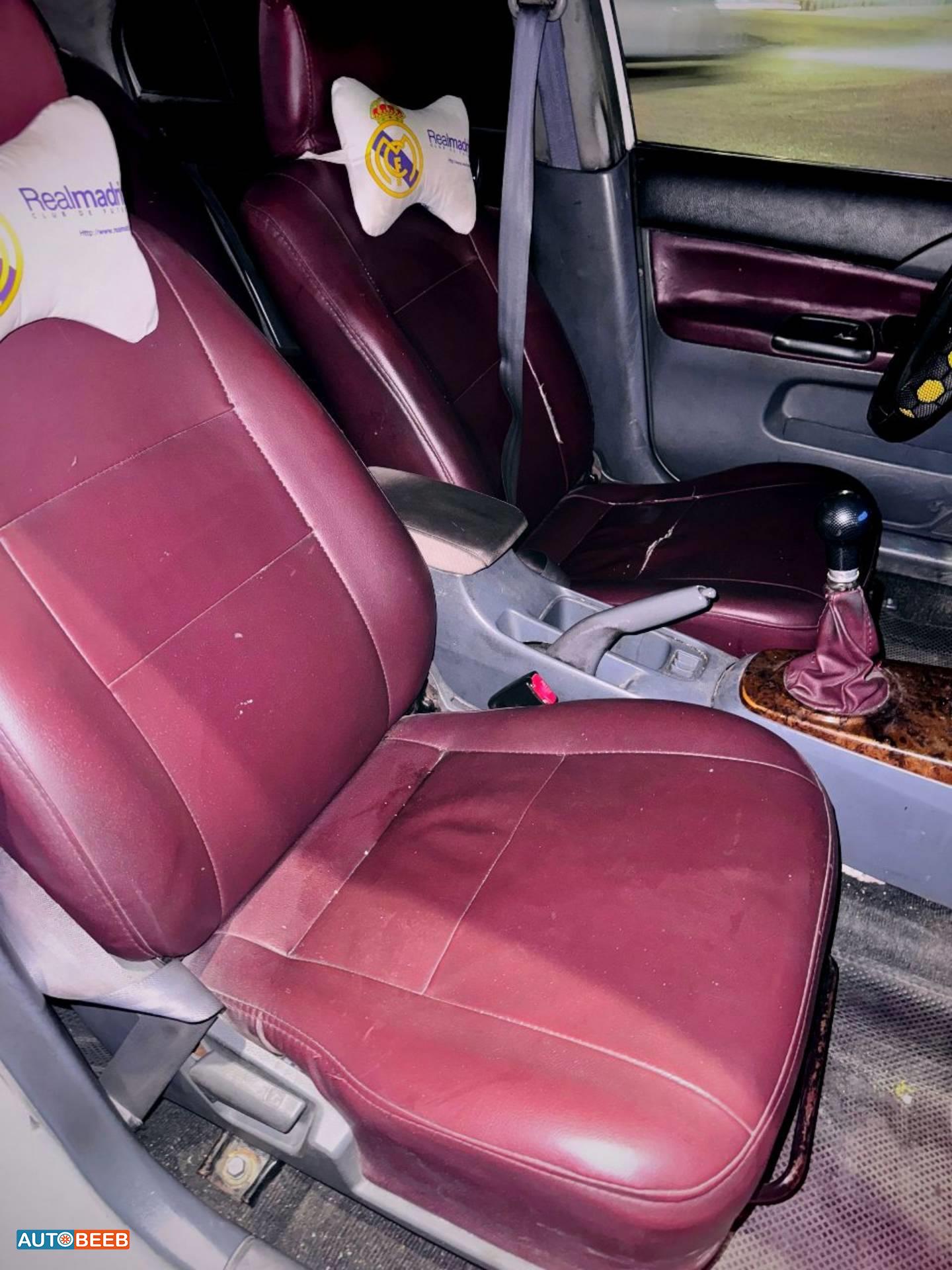 ميتسوبيشي لانسر 2003