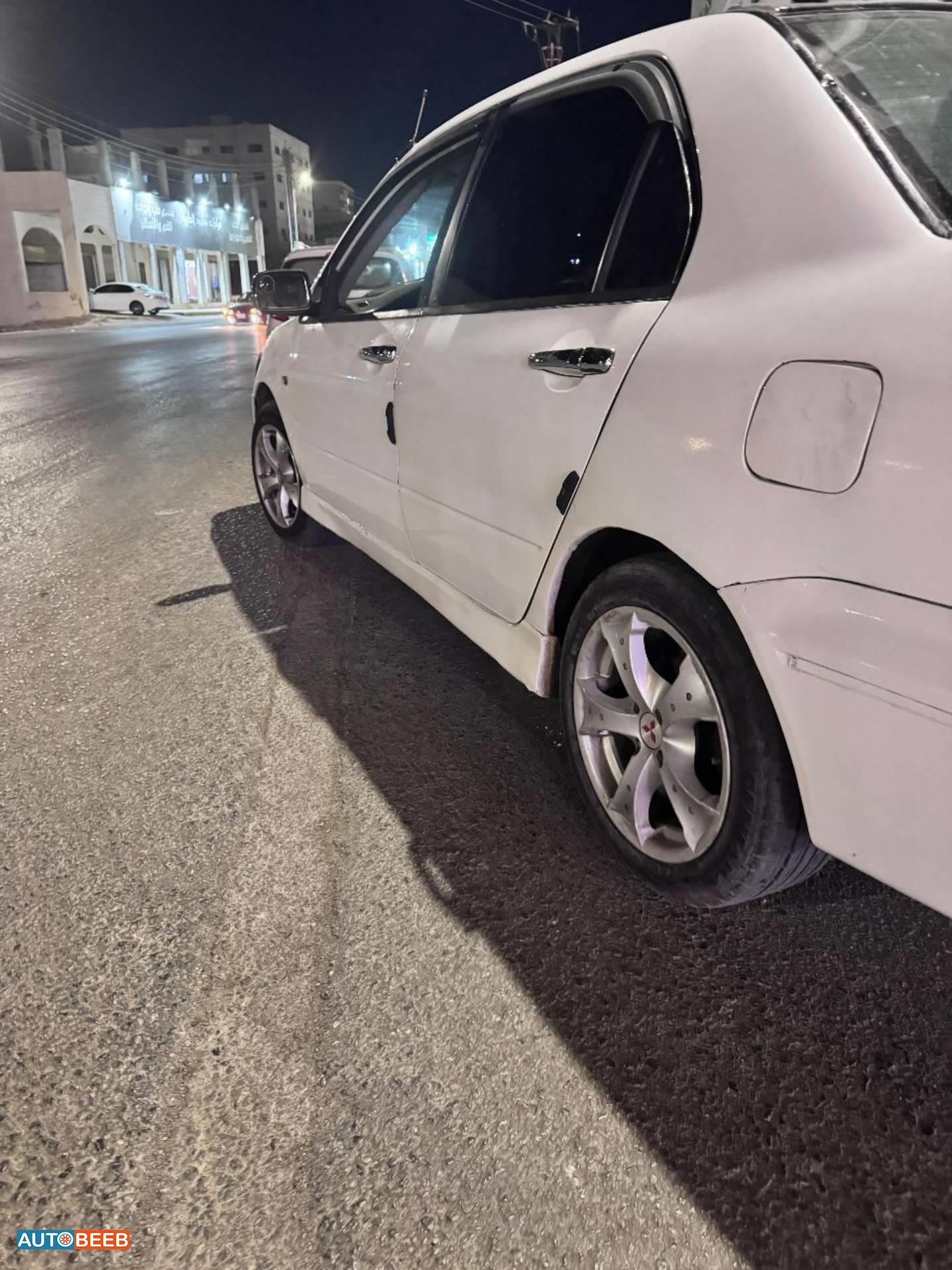 ميتسوبيشي لانسر 2003