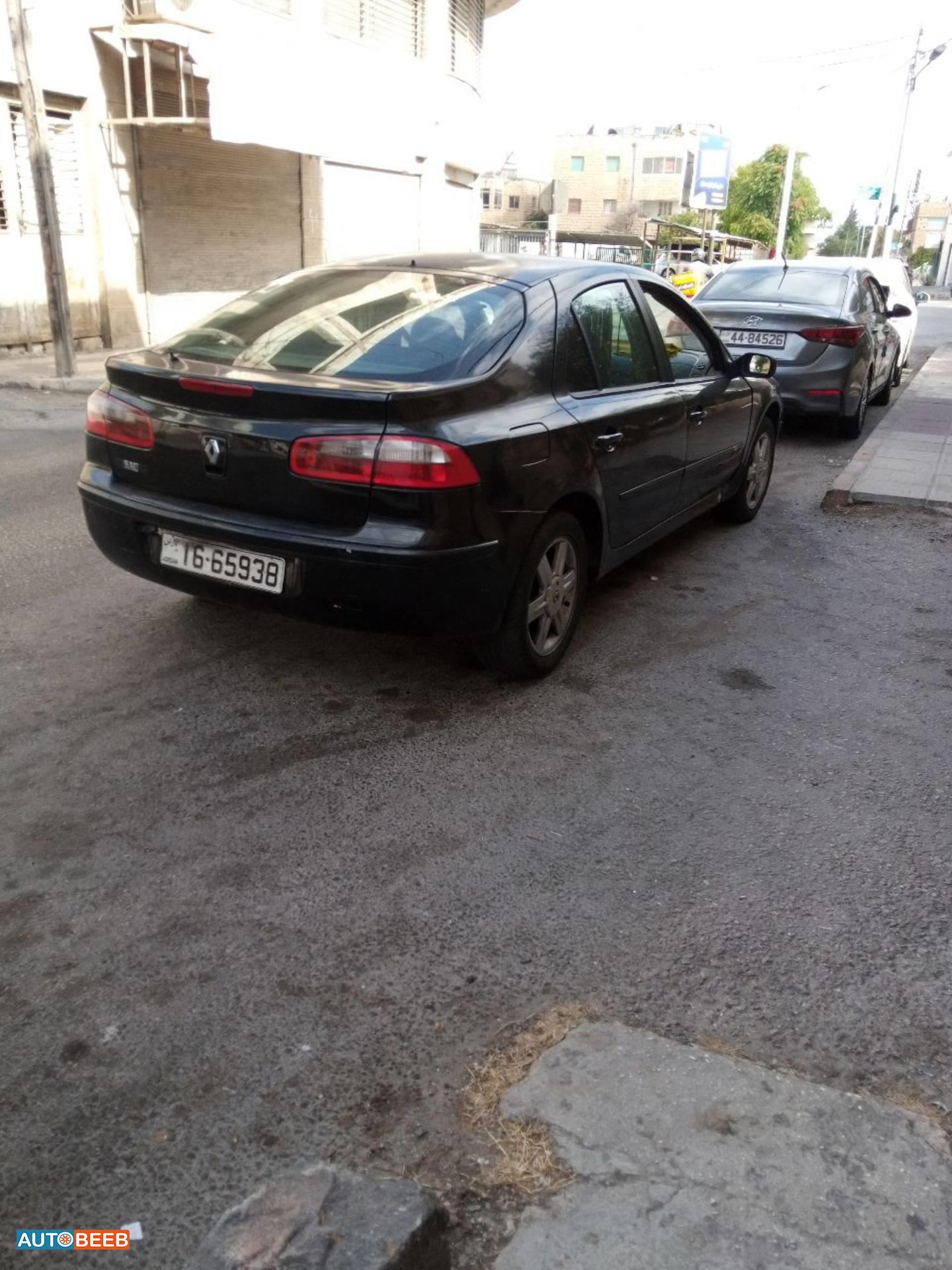 رينو لاجونا 2004