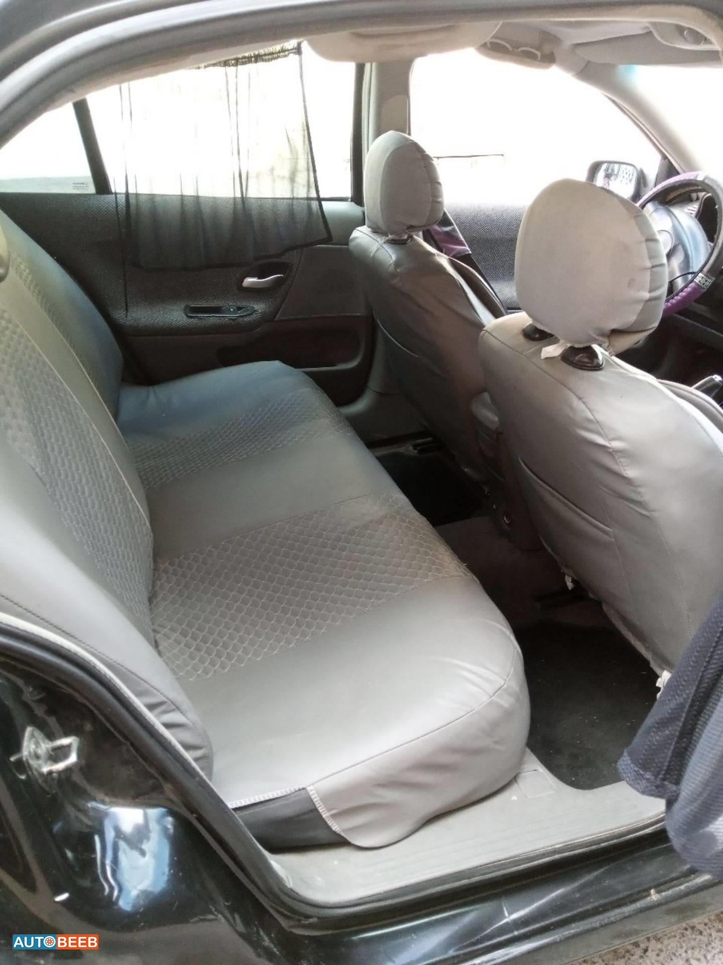 رينو لاجونا 2004