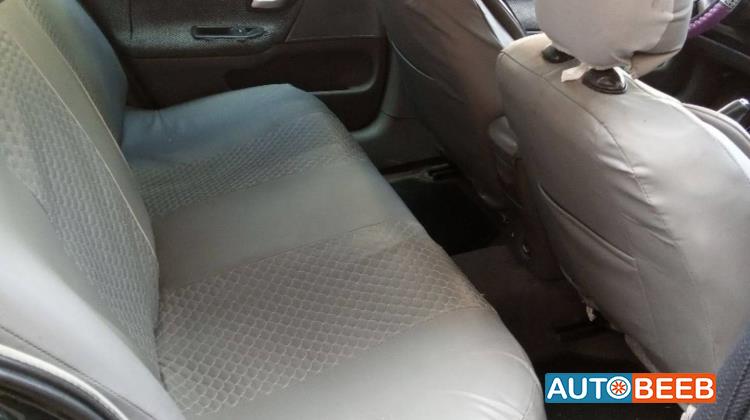 رينو لاجونا 2004