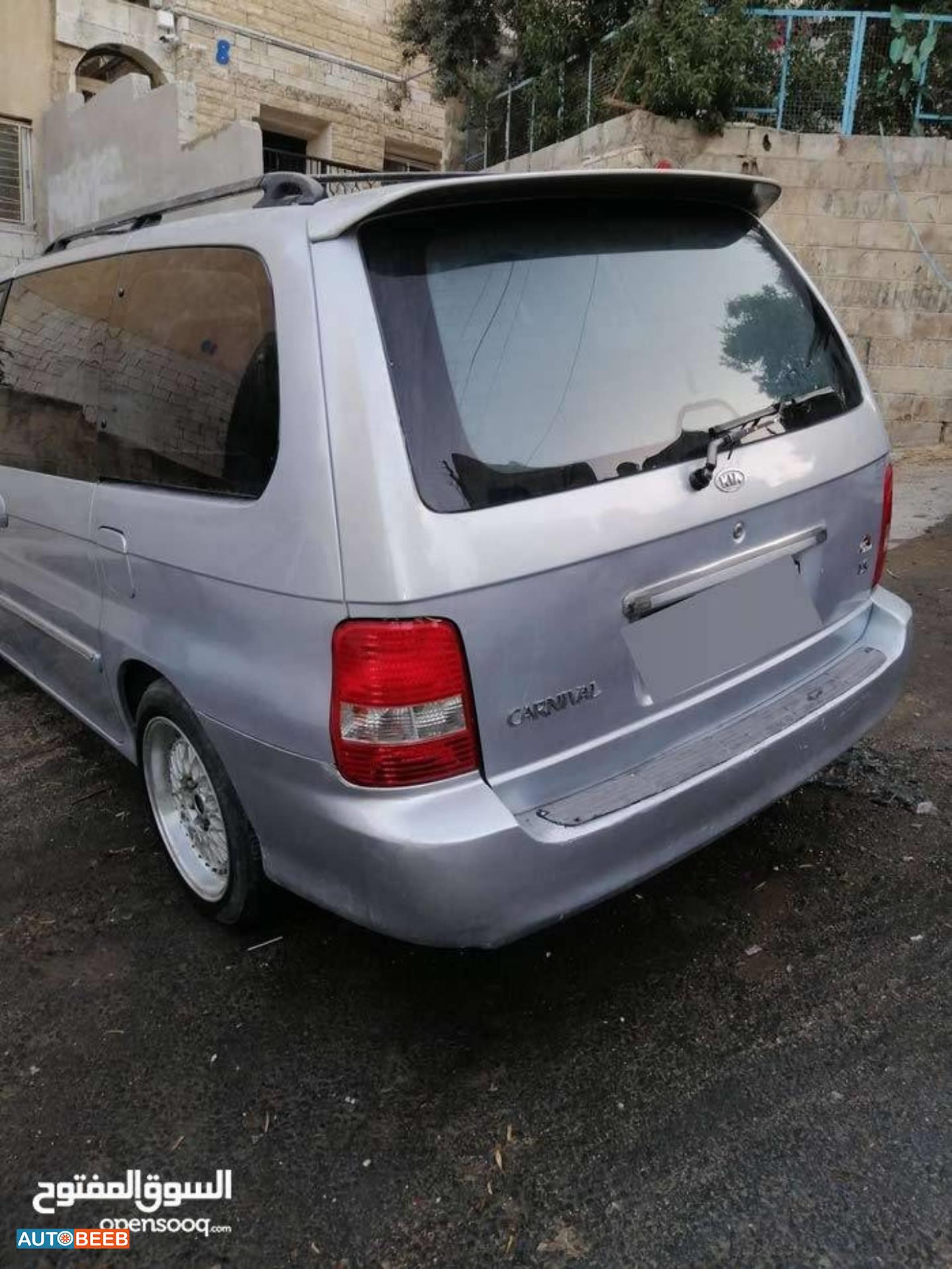 كيا كرنفال 2002