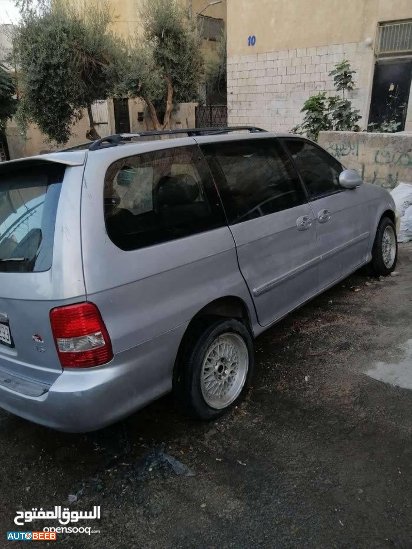 كيا كرنفال 2002