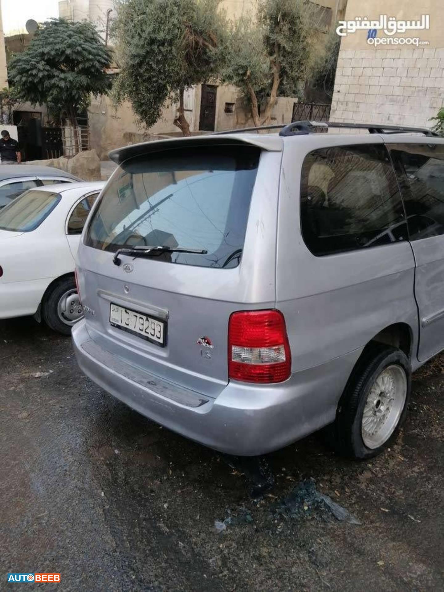 كيا كرنفال 2002