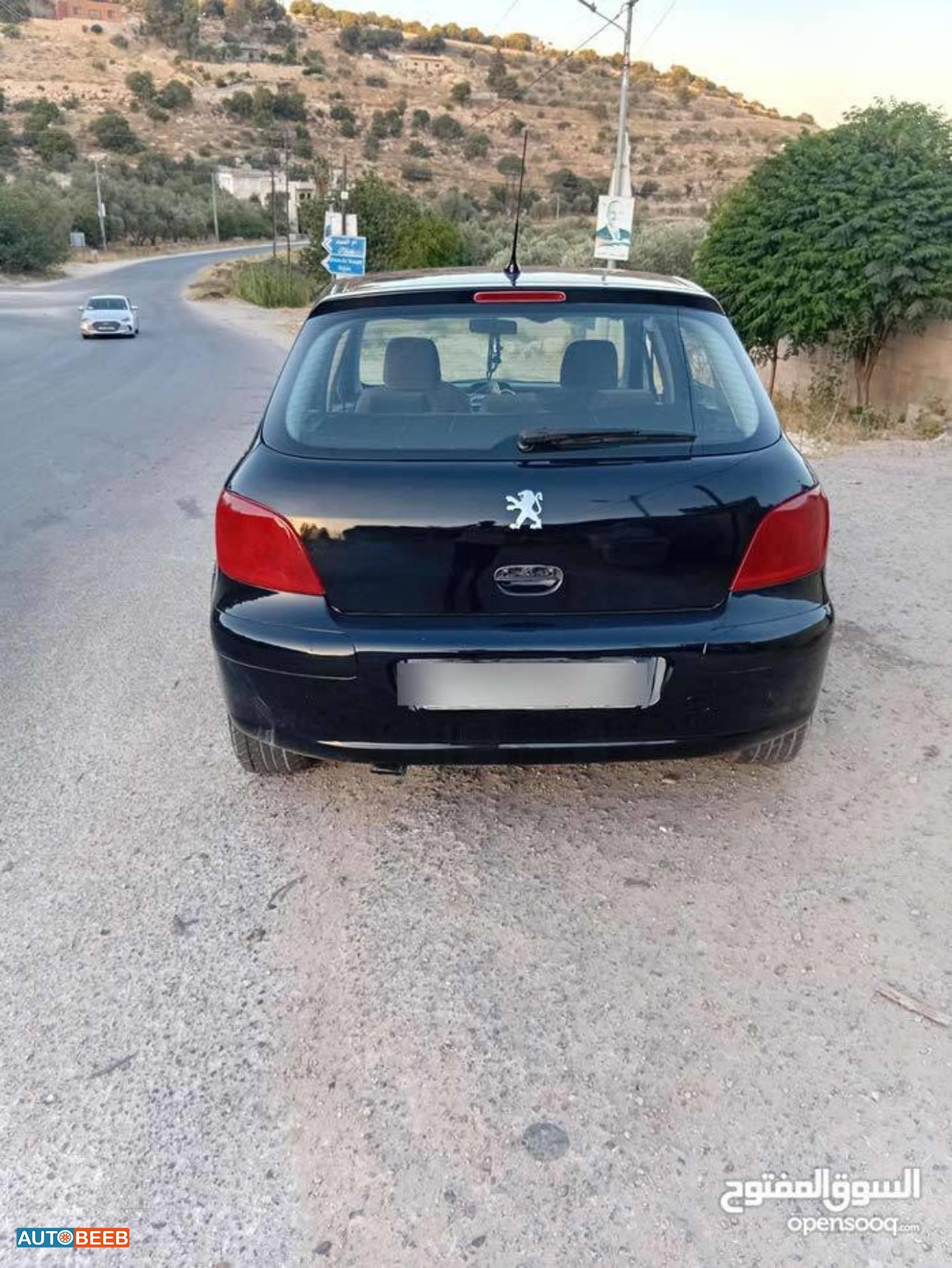 بيجو 307 2004