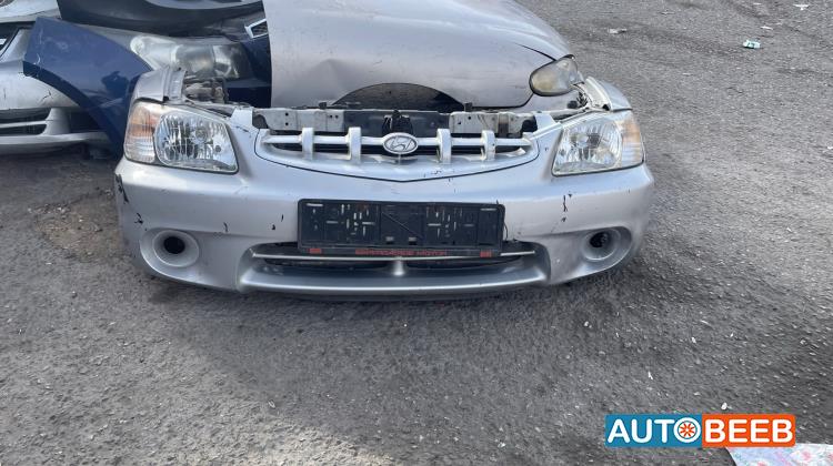 واجهة امامية طمبون اضوية يمين شمال هيونداي فيرنا 2001 2002 2003 2004