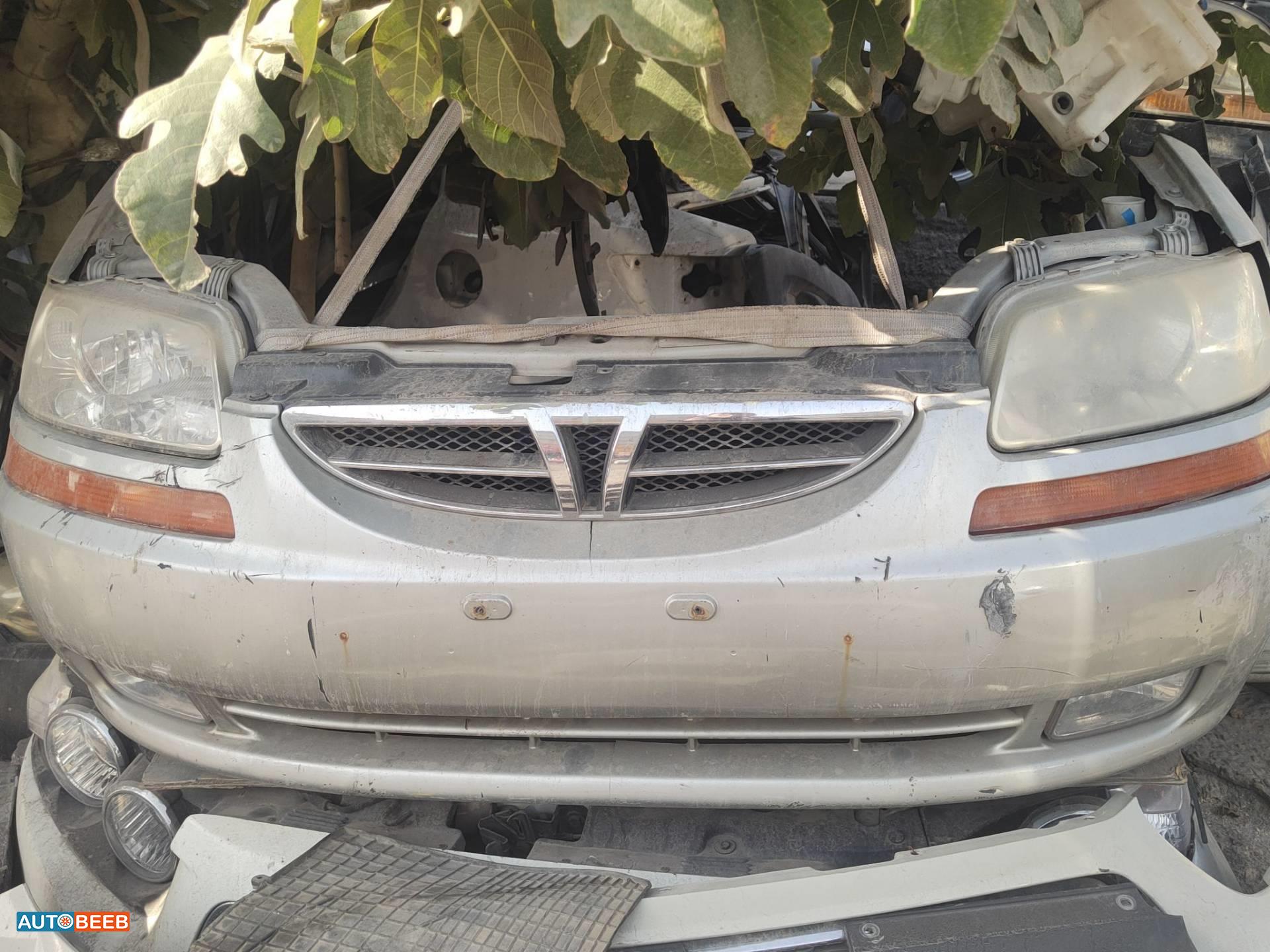 واجهة أمامية طمبون اضوية يمين شمال شيفروليه افيو 2004 2005