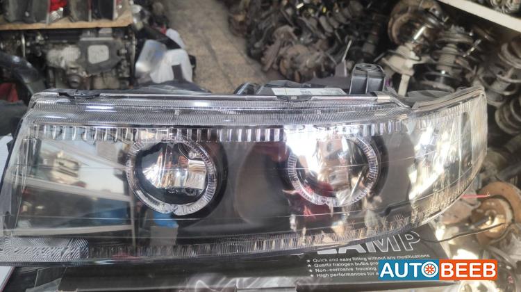 ضوء امامي يمين شمال ميتسوبيشي لانسر 1999 2000 2001