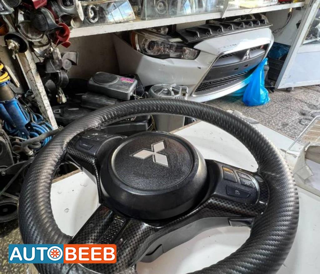 Cabin  Steering Wheel Mitsubishi Lancer