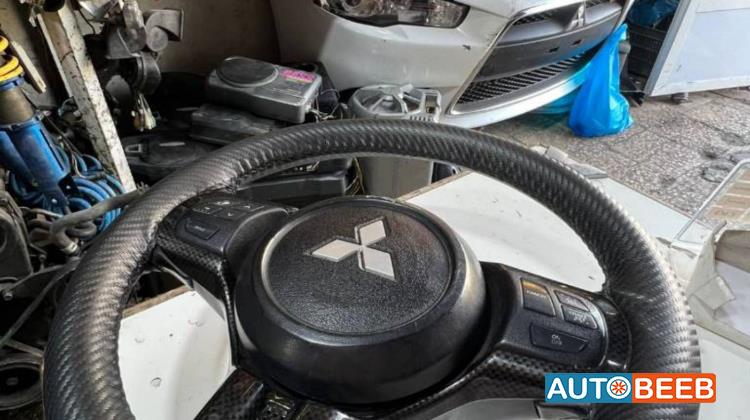 Cabin  Steering Wheel Mitsubishi Lancer