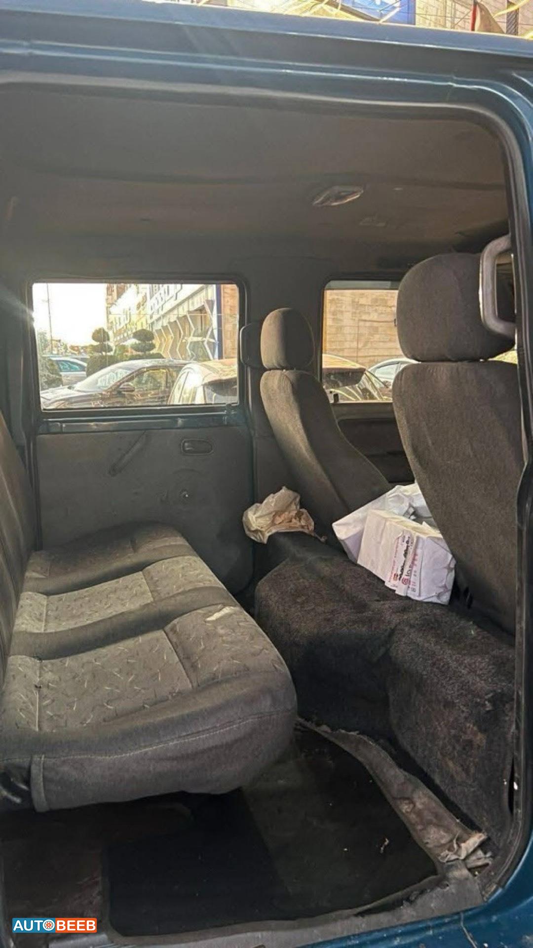 كيا بنجو 2002