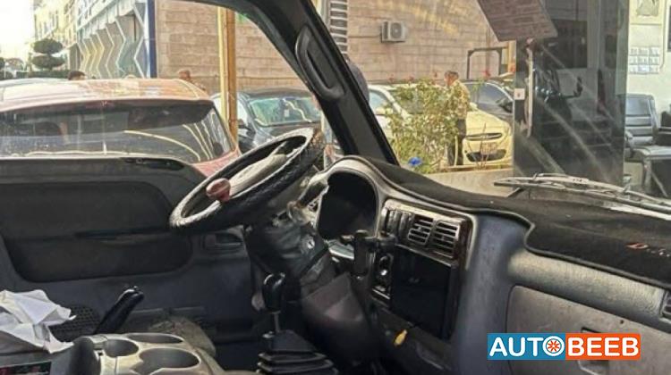 كيا بنجو 2002