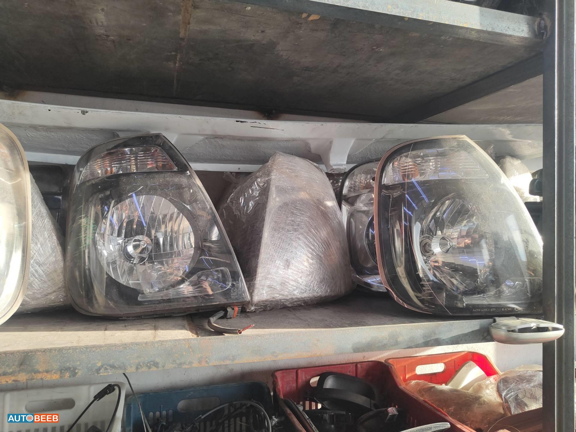 ضوء امامي يمين شمال كيا بنجو 3 2010 2011 2012 2013