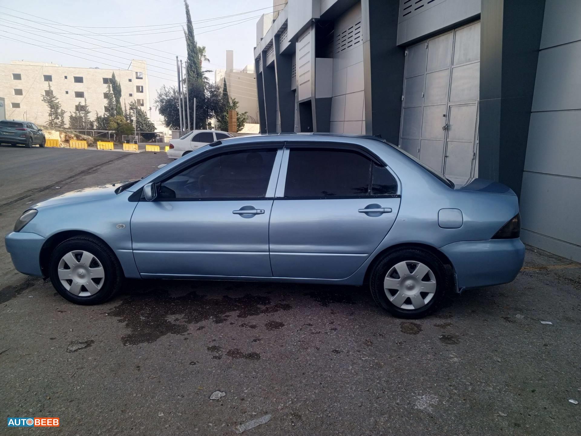 ميتسوبيشي لانسر 2004