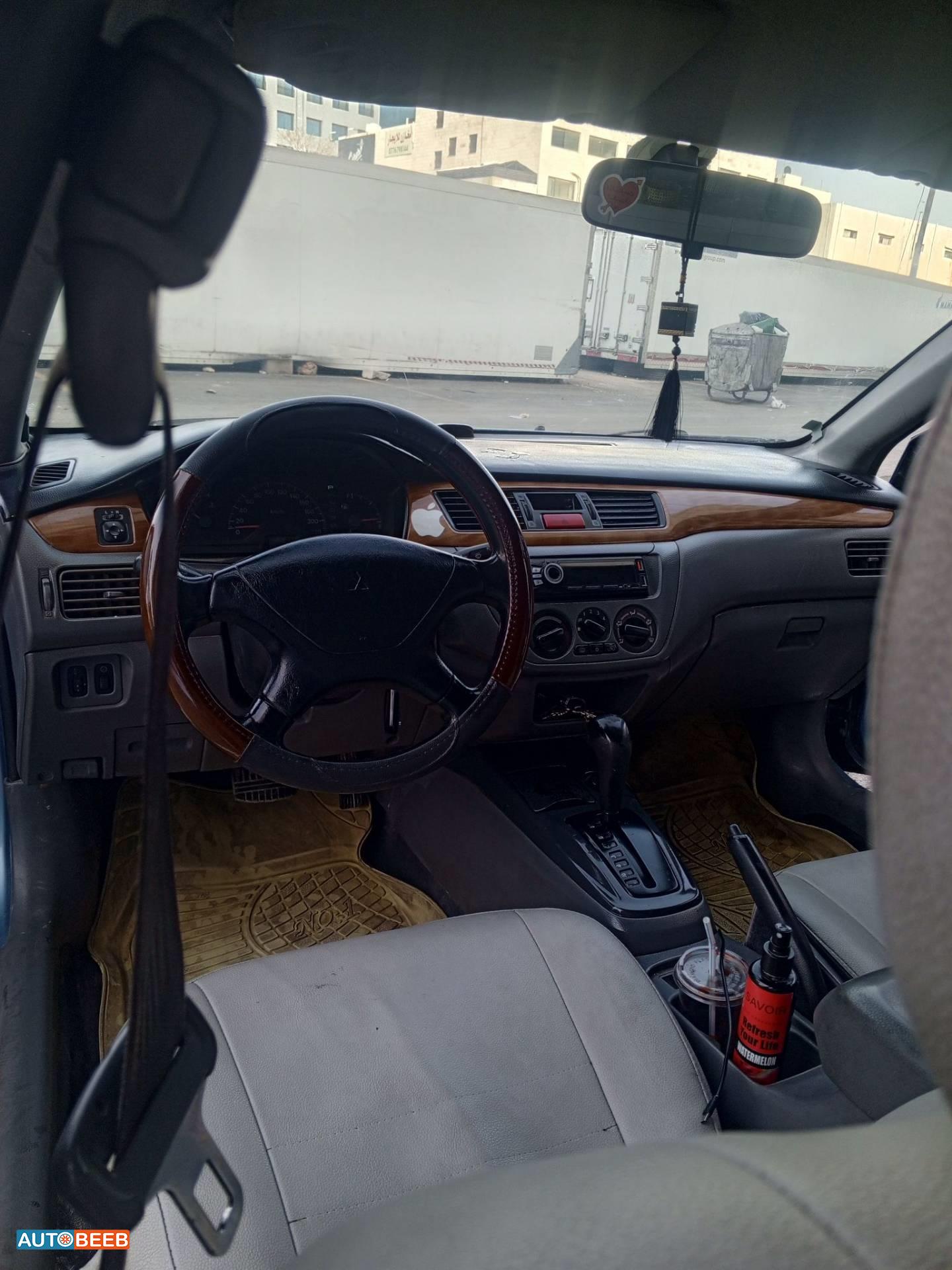 ميتسوبيشي لانسر 2004