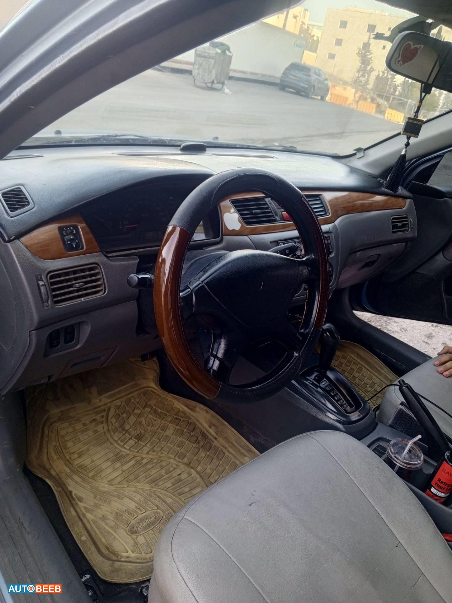 ميتسوبيشي لانسر 2004