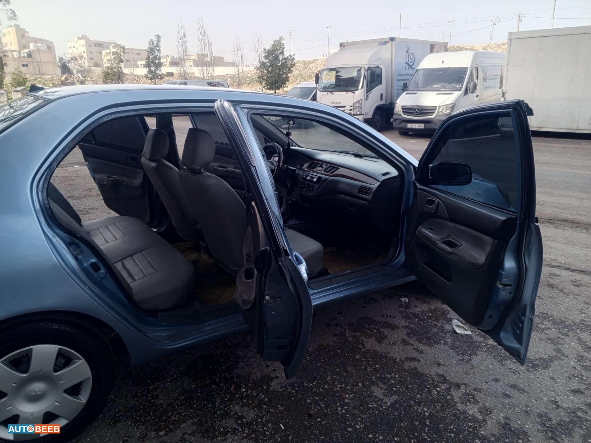 ميتسوبيشي لانسر 2004