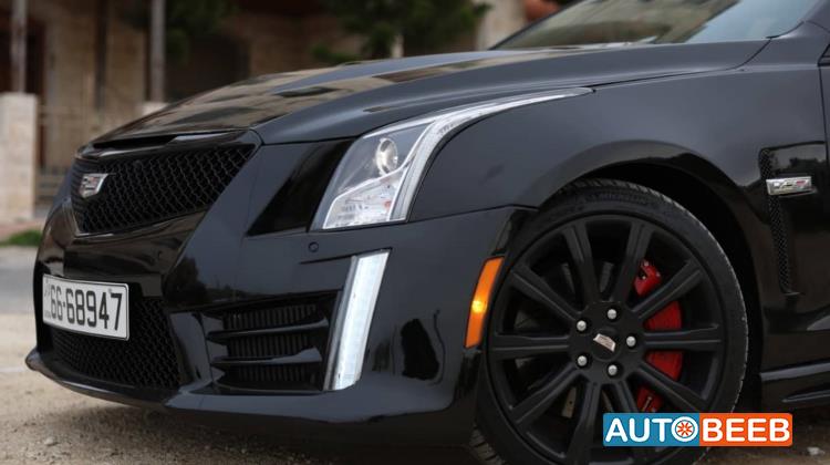 كاديلاك اي تي اس 2014