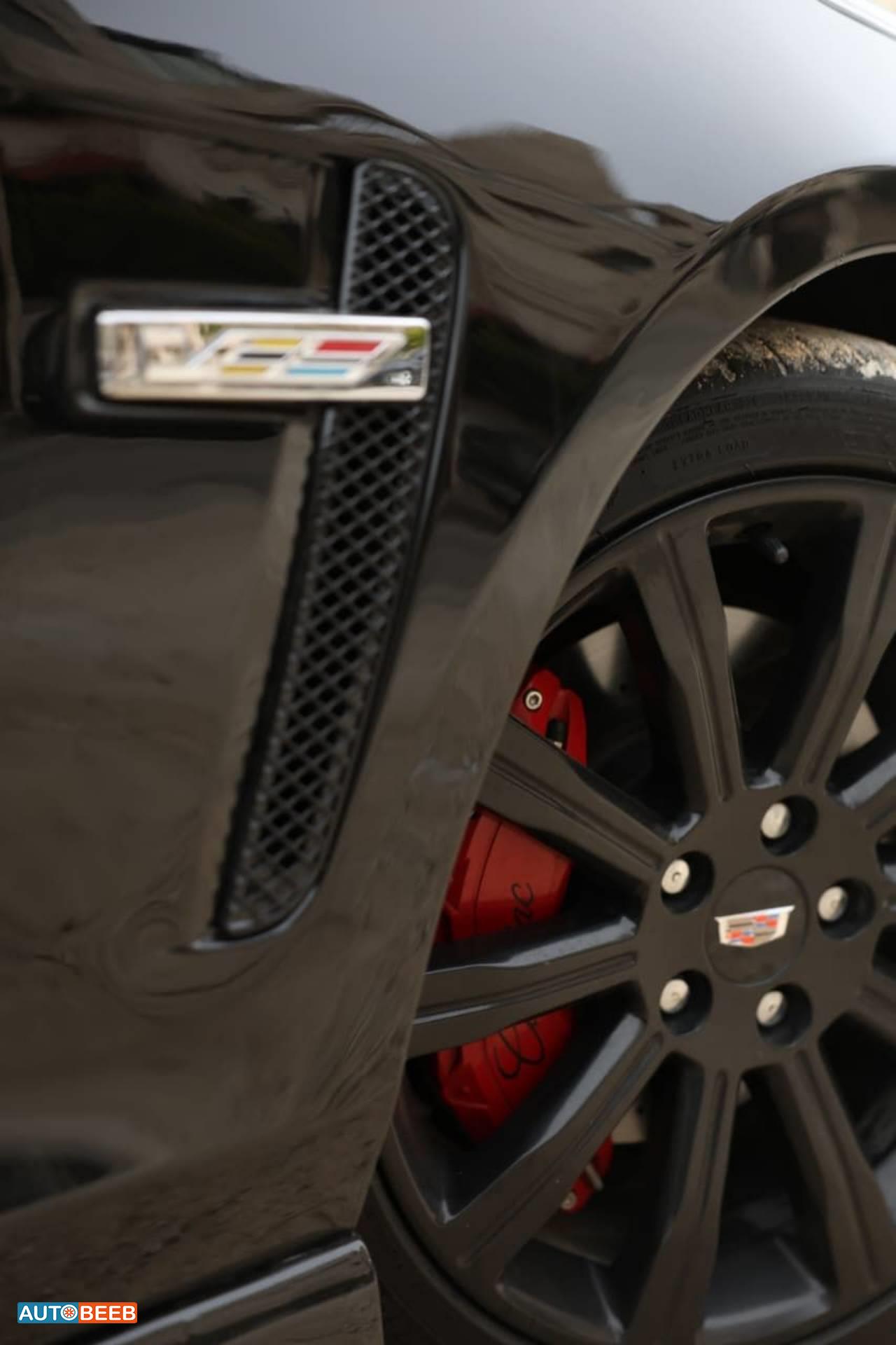 كاديلاك اي تي اس 2014