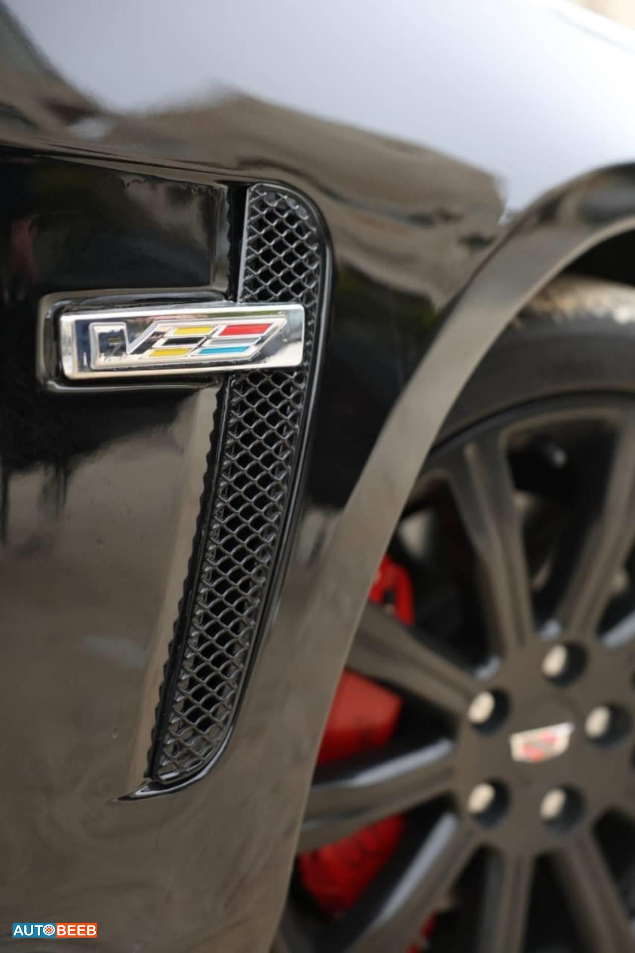 كاديلاك اي تي اس 2014