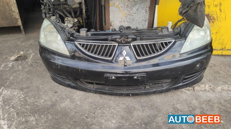 واجهة أمامية طمبون اضوية يمين شمال ميتسوبيشي لانسر 2006 2007 2008