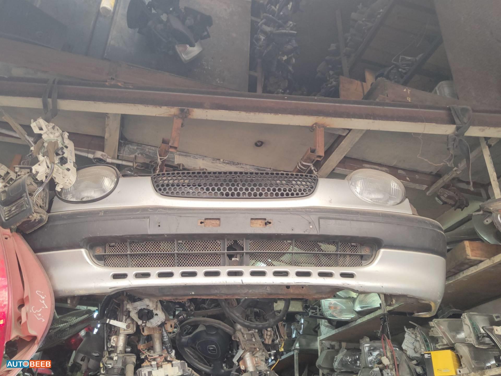 واجهة أمامية طمبون اضوية يمين شمال تويوتا كورولا 1999