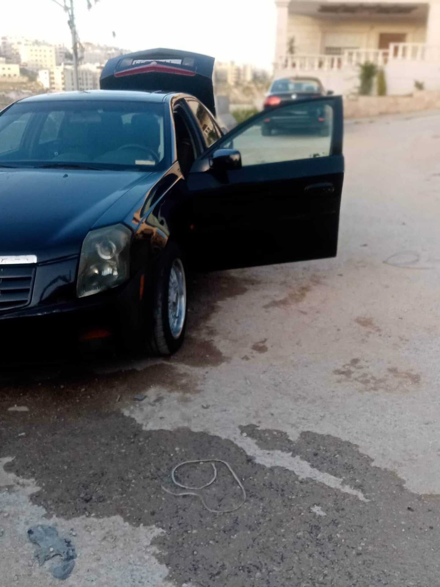 كاديلاك اس تي اس 2003