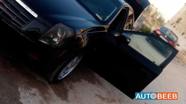 كاديلاك اس تي اس 2003