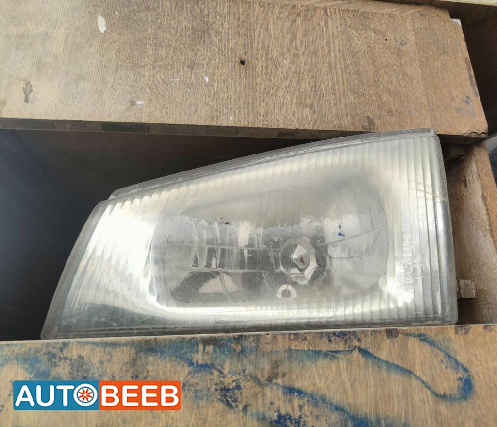 ضوء امامي يمين شمال كيا بريجو 2000