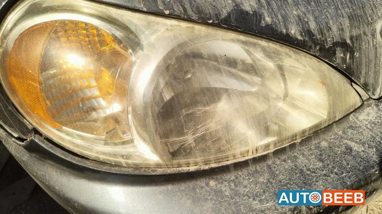 ضوء امامي يمين كيا ريو 2004 2005