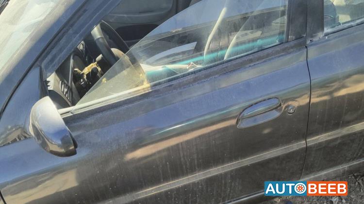 باب امامي يمين شمال كيا ريو 2004 2005